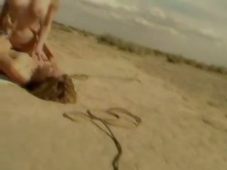 Hot pirang fucks outside on ground in vintage x rated clip